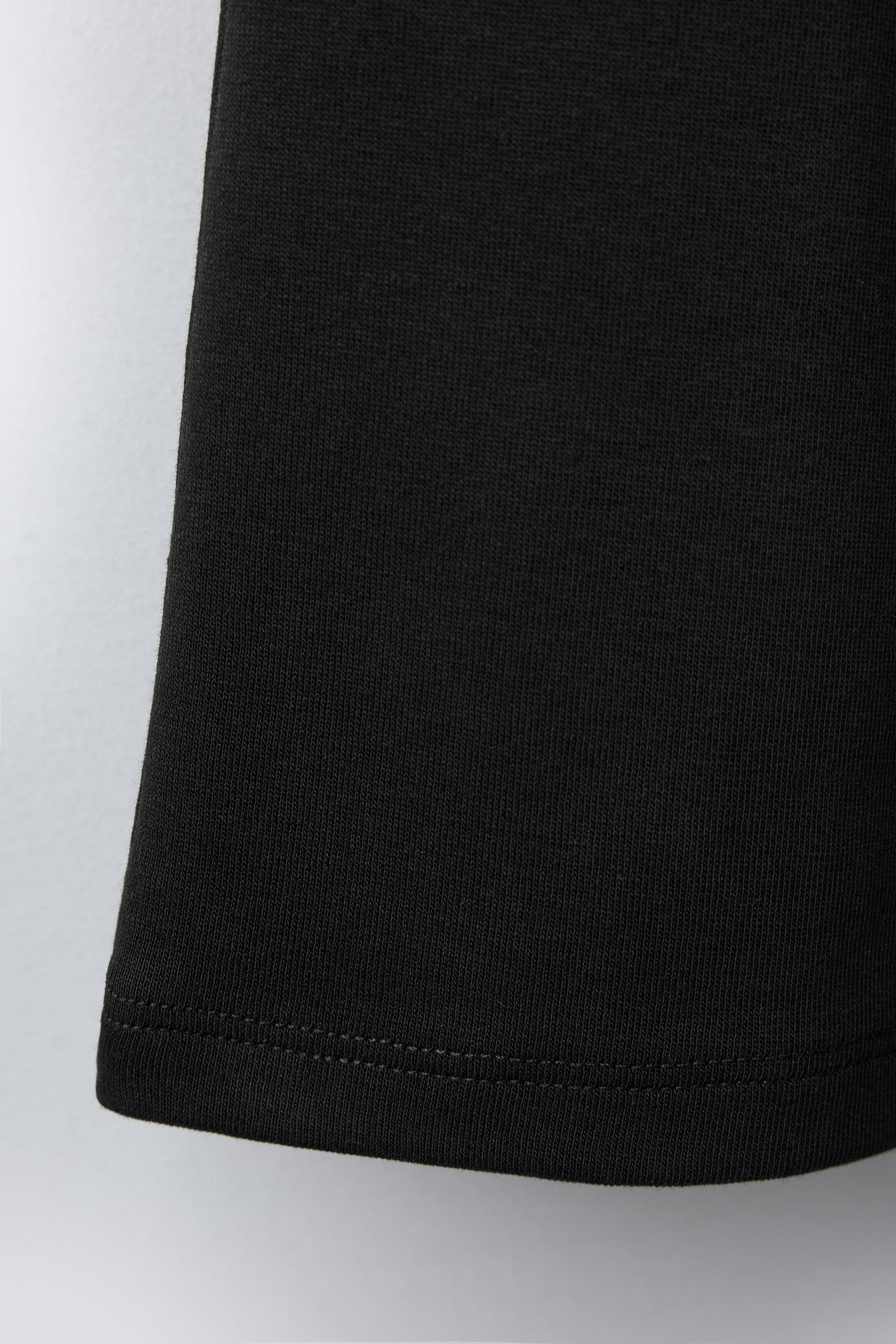 INTERLOCK FLARE LEGGINGS WITH LABEL DETAIL